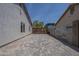 Long driveway with gray pavers between two houses, perfect for multiple vehicles or RV parking at 807 E San Remo Ave, Gilbert, AZ 85234