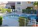 Community pool featuring a spa and plenty of chairs at 8787 E Mountain View Rd # 1110, Scottsdale, AZ 85258
