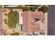Aerial view of home showcasing its well-maintained roof, lush backyard, and pool area at 9623 S 25Th Ln, Phoenix, AZ 85041