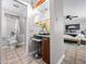 Well-lit bathroom featuring a vanity area, toilet and mirror providing a functional space at 1 W Canterbury Ln, Phoenix, AZ 85023