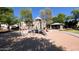 Community playground featuring play structures, slides, and a shaded picnic area, providing a fun and safe environment at 10136 E Isleta Ave, Mesa, AZ 85209