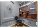 Cozy office features custom shelving, built-in desk, and stylish decor at 10235 E Jerome Ave, Mesa, AZ 85209