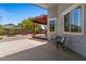Back patio with a pergola, perfect for outdoor dining and relaxation at 10235 E Jerome Ave, Mesa, AZ 85209