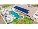 Aerial view of backyard with pool, spa, barbeque, and solar panels on the roof at 10523 E Sleepy Hollow Trl, Gold Canyon, AZ 85118