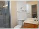 Cozy bathroom featuring a tiled shower, toilet, and a vanity with a mirror at 10523 E Sleepy Hollow Trl, Gold Canyon, AZ 85118