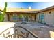 Southwestern style courtyard with water fountain, tiled floor, with outdoor chairs and decor at 10523 E Sleepy Hollow Trl, Gold Canyon, AZ 85118