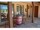 Outdoor patio with bar stools, decor cactus, and views of desert at 10523 E Sleepy Hollow Trl, Gold Canyon, AZ 85118