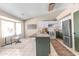 Stylish kitchen with white cabinetry, stainless steel appliances, and a breakfast bar at 10702 W Orangewood Ave, Glendale, AZ 85307