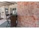 Outdoor patio area with bar seating and decorative walls, ideal for enjoying the outdoors at 10702 W Orangewood Ave, Glendale, AZ 85307