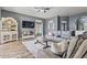 Comfortable living room with contemporary decor and a cozy atmosphere at 11550 W Mule Deer Ct, Surprise, AZ 85378