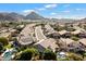 Neighborhood aerial featuring mountain views and tree lined streets at 1216 E Rocky Slope Dr, Phoenix, AZ 85048