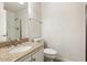 Simple bathroom with a granite countertop vanity, toilet, and shower at 1216 E Rocky Slope Dr, Phoenix, AZ 85048