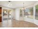 Bright dining area with sliding door access to the outdoor space and tile flooring at 1216 E Rocky Slope Dr, Phoenix, AZ 85048