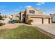 Charming home with meticulously maintained lawn and desert landscaping at 1216 E Rocky Slope Dr, Phoenix, AZ 85048