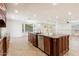 Large kitchen island featuring granite countertops, stainless steel dishwasher, and custom wood cabinetry at 1216 E Rocky Slope Dr, Phoenix, AZ 85048