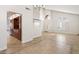 Open floor plan featuring tile flooring, neutral paint, and an arched entryway at 1216 E Rocky Slope Dr, Phoenix, AZ 85048