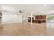 Hardwood flooring in an open floor plan featuring living area and kitchen space at 1216 E Rocky Slope Dr, Phoenix, AZ 85048