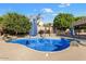 Backyard pool featuring a waterfall and desert landscaping at 1216 E Rocky Slope Dr, Phoenix, AZ 85048