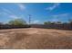 Large backyard surrounded by fencing at 1466 E Nielson Ave, Mesa, AZ 85204