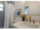 Bright bathroom featuring stylish decor, modern fixtures and bathtub shower at 1466 E Nielson Ave, Mesa, AZ 85204