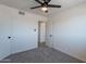 Bedroom featuring closet with a view to the adjacent room at 1466 E Nielson Ave, Mesa, AZ 85204