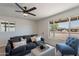 Spacious living room with comfortable seating, neutral decor, and natural light at 1466 E Nielson Ave, Mesa, AZ 85204