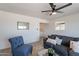 Inviting living room featuring a gray sofa and natural light at 1466 E Nielson Ave, Mesa, AZ 85204