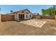 The backyard has a block fence, storage shed, and covered patio, perfect for relaxing and entertaining at 14936 W Maui Ln, Surprise, AZ 85379