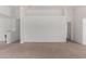 Bright living room showcasing a soaring ceiling, neutral paint, and plush carpeting at 14936 W Maui Ln, Surprise, AZ 85379