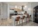 Modern kitchen with stainless steel appliances, white countertops, and a stylish island with seating at 15215 N Kierland Blvd # 101, Scottsdale, AZ 85254