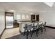 A community kitchenette featuring stainless steel appliances and barstool seating at 15215 N Kierland Blvd # 101, Scottsdale, AZ 85254