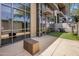 A ground level patio with outdoor seating and a barbecue grill at 15215 N Kierland Blvd # 101, Scottsdale, AZ 85254