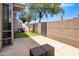 A fenced in ground level patio with a barbecue grill and outdoor seating at 15215 N Kierland Blvd # 101, Scottsdale, AZ 85254