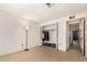 Bedroom featuring a closet with sliding doors and bare walls at 1602 N 73Rd Dr, Phoenix, AZ 85035