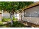 Close up of the home's entry showing a metal security door and window coverings at 1602 N 73Rd Dr, Phoenix, AZ 85035