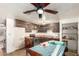 A view of the kitchen featuring outdated cabinets and appliances at 1602 N 73Rd Dr, Phoenix, AZ 85035