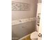 Powder bathroom featuring a decorative wall, and modern fixtures at 16029 W Ocotillo Ln, Surprise, AZ 85374