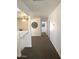 Upstairs hallway with carpet, neutral paint and natural light at 16029 W Ocotillo Ln, Surprise, AZ 85374
