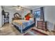 Comfortable main bedroom with neutral walls, ceiling fan and wood floor at 18035 N 29Th Dr, Phoenix, AZ 85053