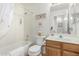 Standard bathroom with a tub-shower combo, vanity with sink, and a toilet at 19546 N 53Rd Ave, Glendale, AZ 85308