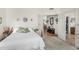 Cozy bedroom with neutral tones, soft carpet, and access to living areas, providing a comfortable and private space at 19546 N 53Rd Ave, Glendale, AZ 85308