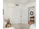 Bedroom with closet, light-colored carpet, and doorway leading to another room at 19546 N 53Rd Ave, Glendale, AZ 85308