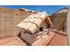 Charming custom dog house with a tiled roof and brick pavers in a private outdoor area at 19546 N 53Rd Ave, Glendale, AZ 85308