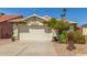 Inviting front exterior featuring a well-maintained landscape and a spacious two-car garage at 19546 N 53Rd Ave, Glendale, AZ 85308