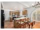 Bright kitchen featuring an island with bar seating and stainless steel appliances, creating a functional cooking space at 19546 N 53Rd Ave, Glendale, AZ 85308