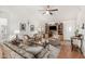 Cozy living room with vaulted ceilings, neutral paint, ceiling fan, and tile floors at 19546 N 53Rd Ave, Glendale, AZ 85308