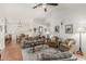 Open-concept living room with high ceilings and ample natural light, ideal for Gathering gatherings and relaxation at 19546 N 53Rd Ave, Glendale, AZ 85308