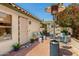 Charming patio with brick flooring, outdoor seating and ceiling fan, perfect for relaxing at 19546 N 53Rd Ave, Glendale, AZ 85308