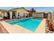 Sparkling pool with an extended patio area and sun loungers, perfect for outdoor enjoyment at 19546 N 53Rd Ave, Glendale, AZ 85308