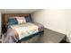 Cozy bedroom featuring a unique headboard and stylish bedding at 1956 E Calle De Caballos --, Tempe, AZ 85284